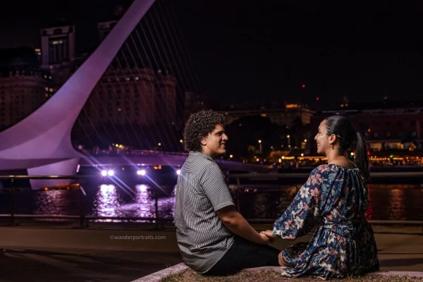 Night couple portraits with the women's bridge in the background
