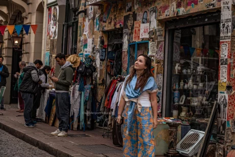 Woman discovering San telmo while is captured by a professional photographer in buenos aires